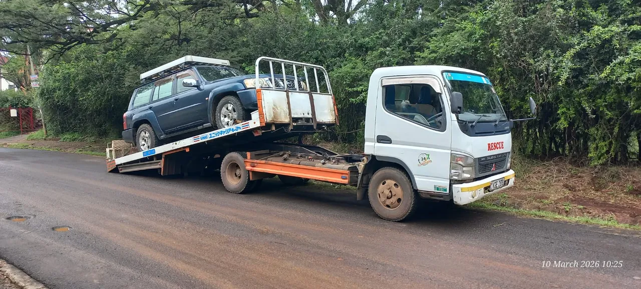 Autoplus 254 flatbed tow truck for safe vehicle transport in Nairobi